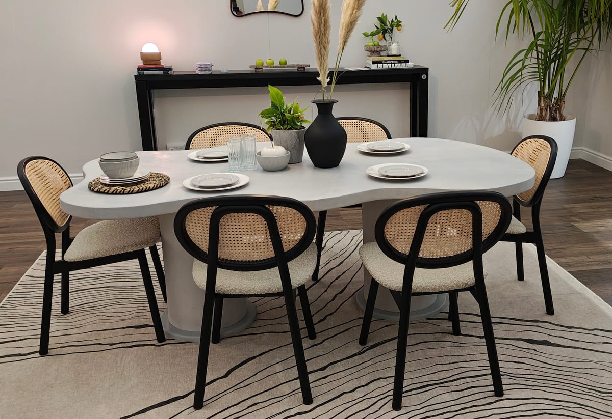 Cloud polished concrete dining table with sculptural base