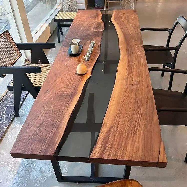 Live edge timber dining table with flowing resin river centre and steel base