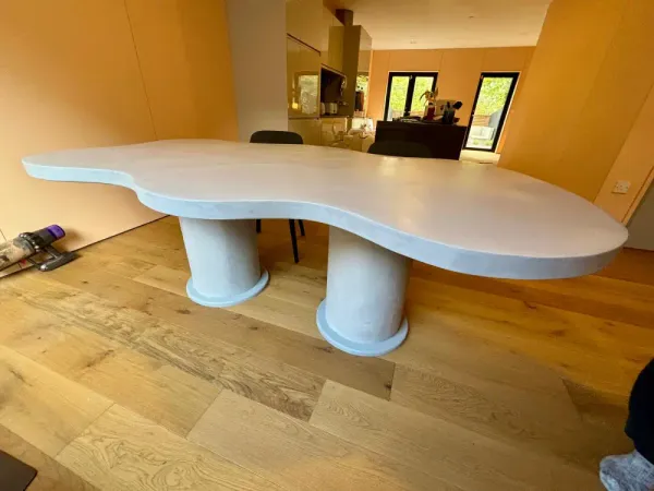 Material comparison guide for polished concrete, resin river and live edge dining tables with finish and lifestyle factors